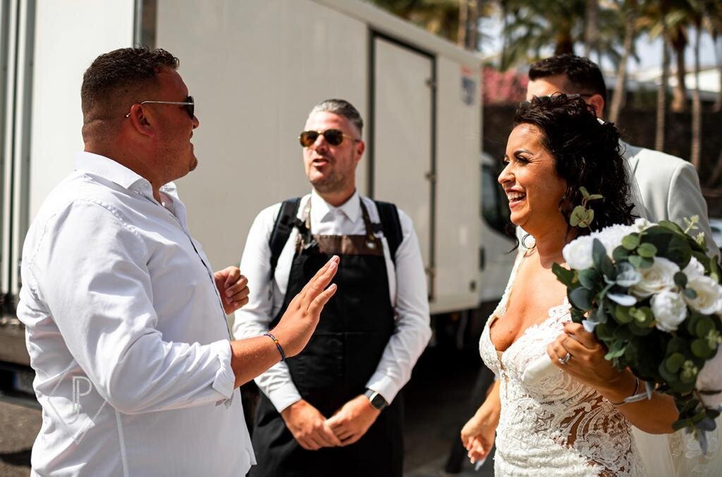 Singing waiters with a bride on her wedding day