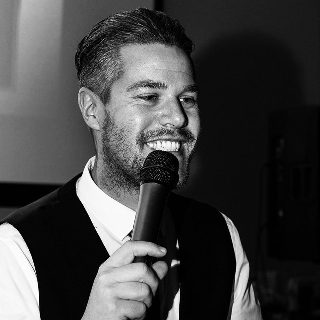 Michael Sharpe, founder of The Undercover Waiters singing waiters