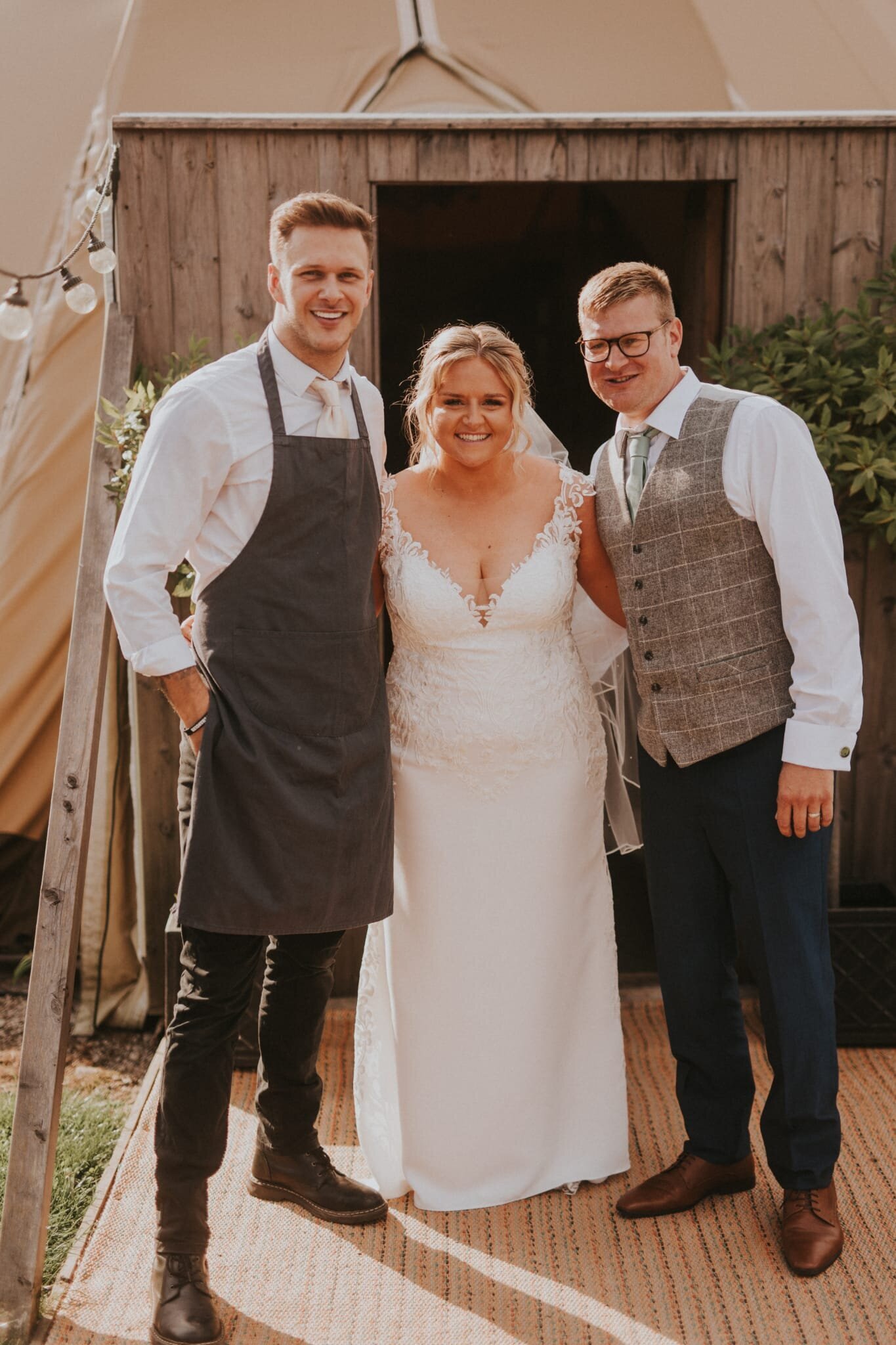 Singing waiters with a bride on her wedding day